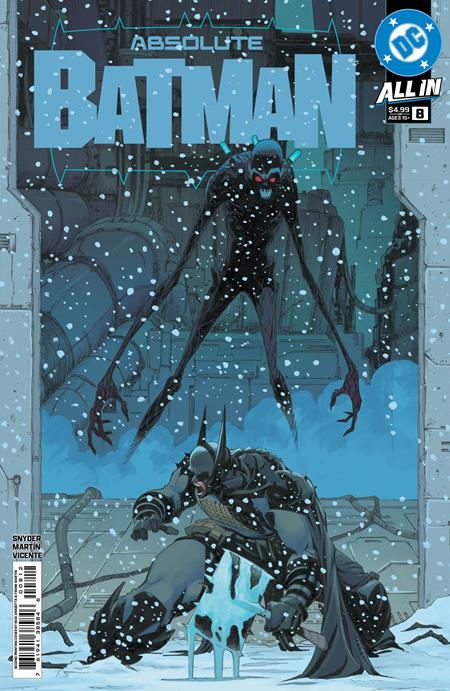 Comic book cover featuring Batman in a snowy scene with an alien creature.