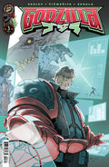 Comic book cover featuring a character in a suit with a futuristic background and 'Godzilla' logo.