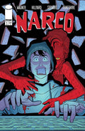 A young guy screaming while typing on a keyboard with a red creature coming from behind him.